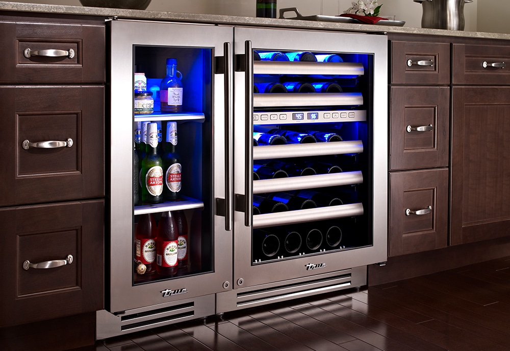 kitchen with true undercounter wine cabinet and refrigerator
